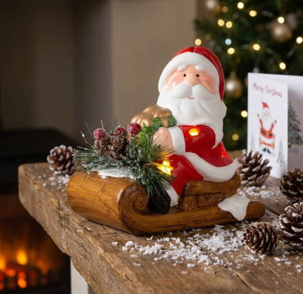 Dekorácia MagicHome Vianoce, Santa na saniach, LED, terakota, 12,6x8,5x11,5 cm